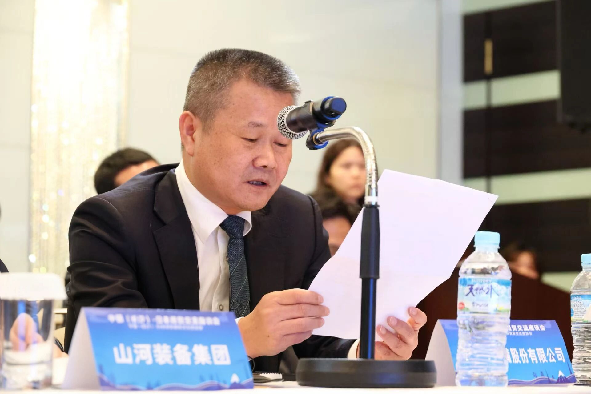 必发集团智能出席中日经贸互换座谈会，签署战术合作和谈